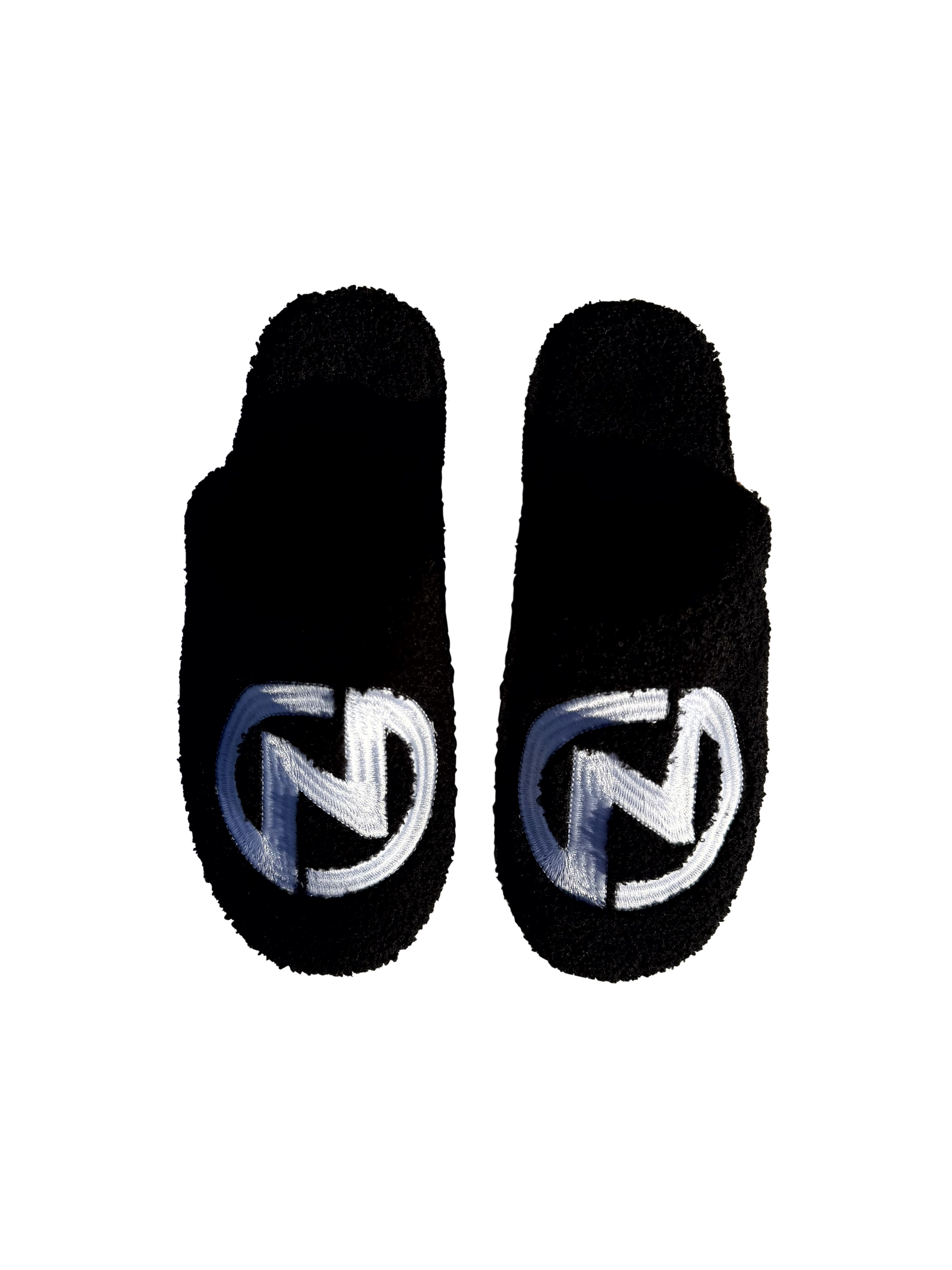 FUR SLIPPERS IN BLACK/WHITE